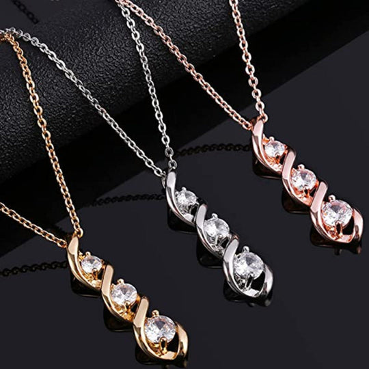 Collier en or blanc avec pendentif en forme d'infini et zircons