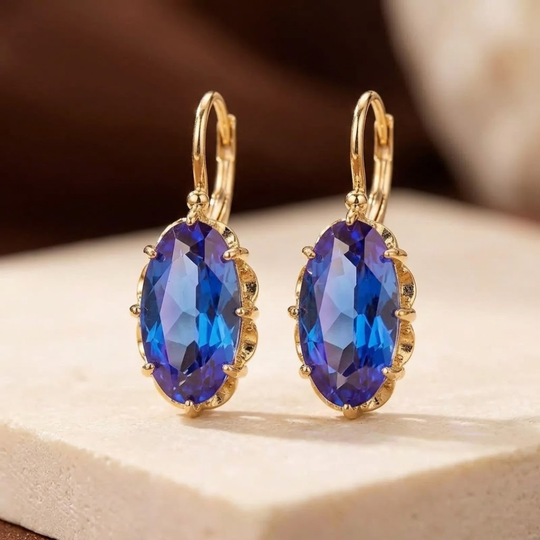 Boucles d'oreilles pendantes en or et saphir