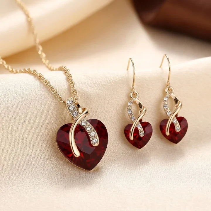 Ensemble de bijoux en cœur torsadé en or et rubis