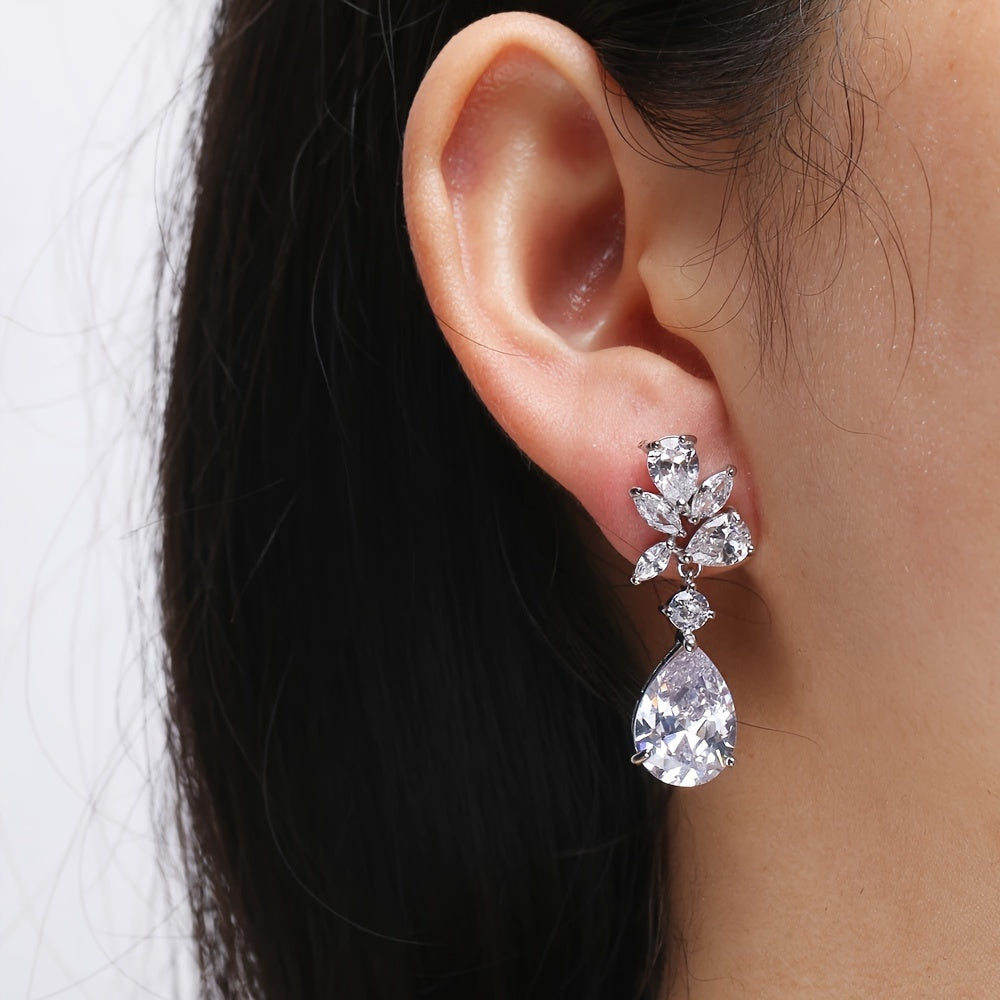 Boucles d'oreilles en goutte avec fleurs en or blanc