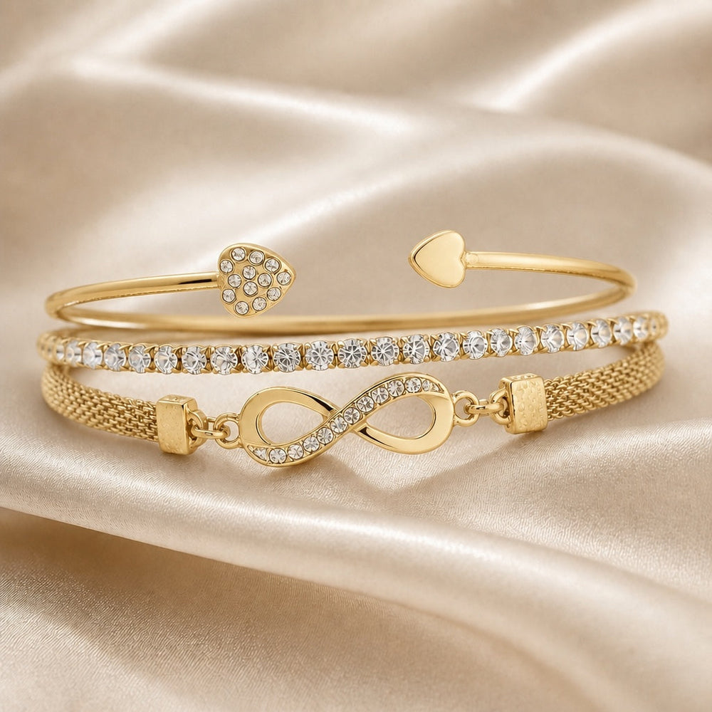 Collection de bracelets avec strass en or blanc et motif infini