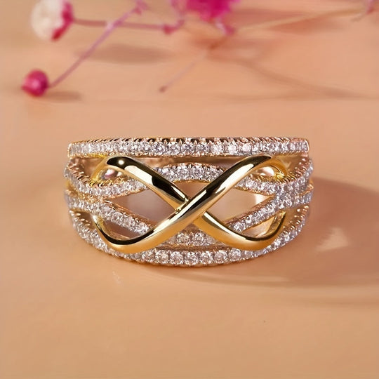Bague "Infinie" en zirconium plaqué or blanc