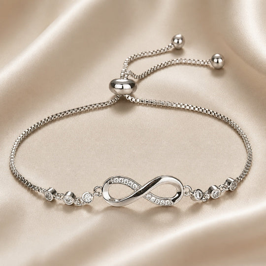 Bracelet coulissant avec symbole de l'infini en or blanc