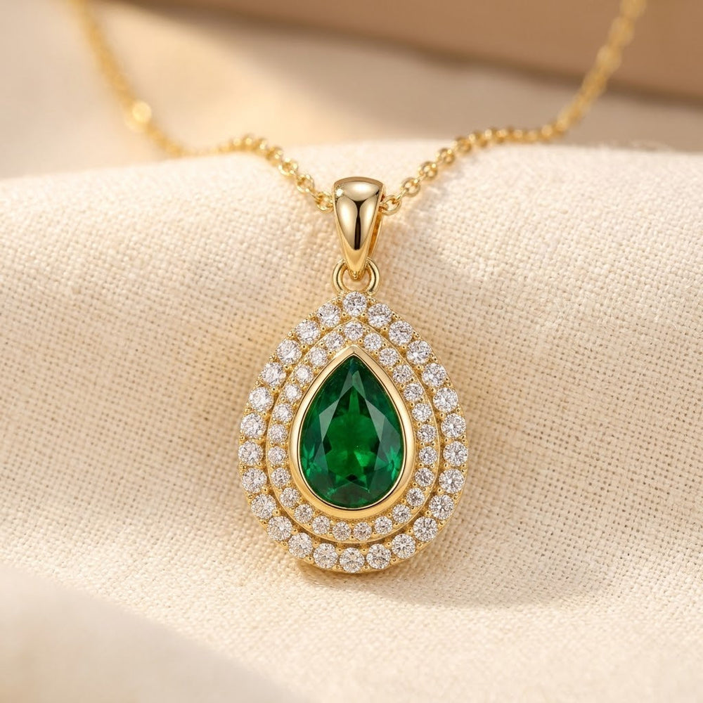 Collier en goutte d'eau en or et émeraude
