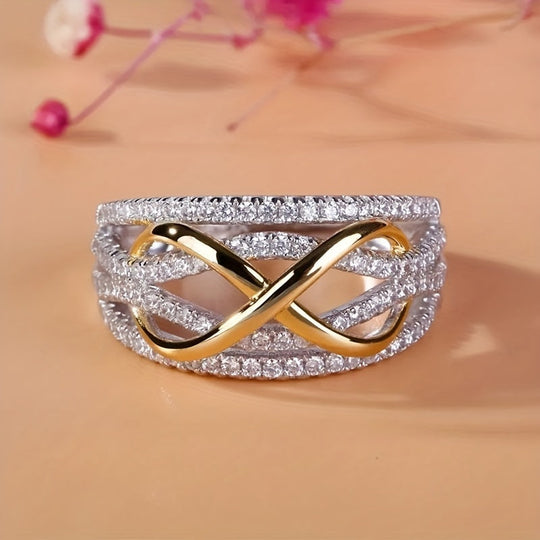 Bague "Infinie" en zirconium plaqué or blanc