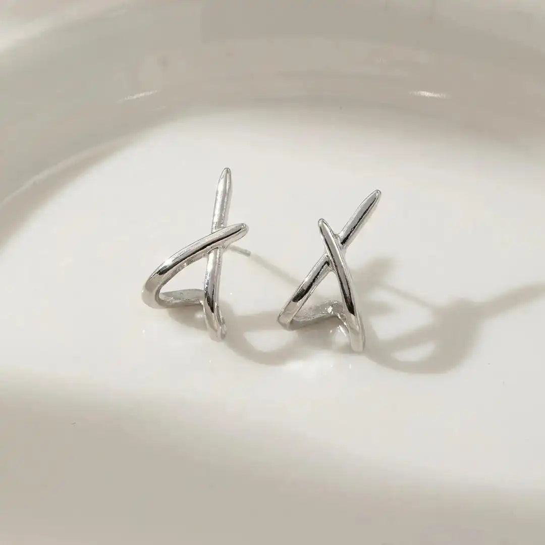 Boucles d'oreilles en croix dorées intemporelles