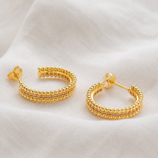 Boucles d'oreilles créoles en cristal clouté