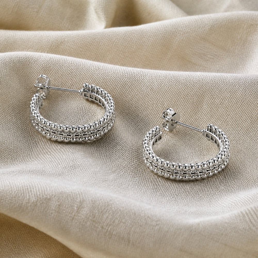 Boucles d'oreilles créoles en cristal clouté
