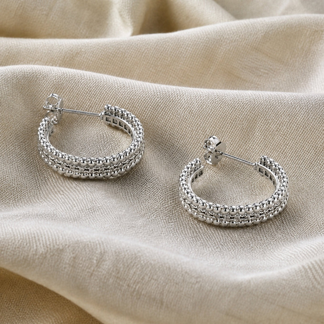 Boucles d'oreilles créoles en cristal clouté