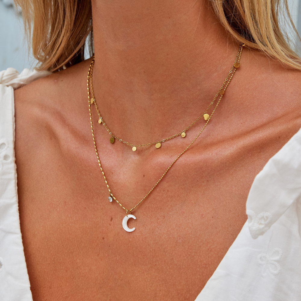 Collier en forme de croissant blanc