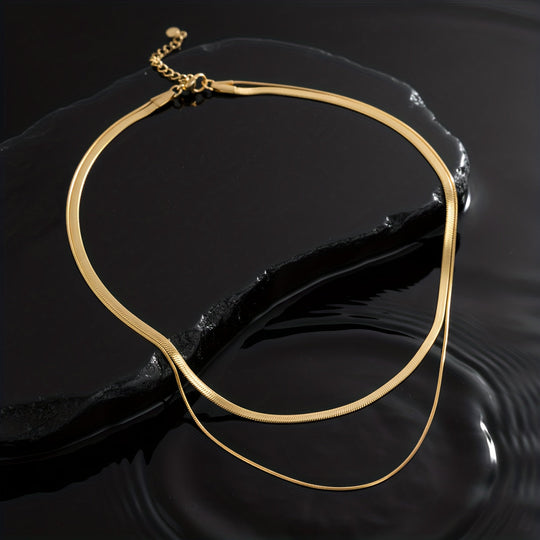 Collier à couches avec serpents en or blanc
