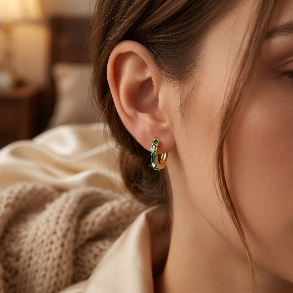 Boucles d'oreilles créoles en or et émeraude