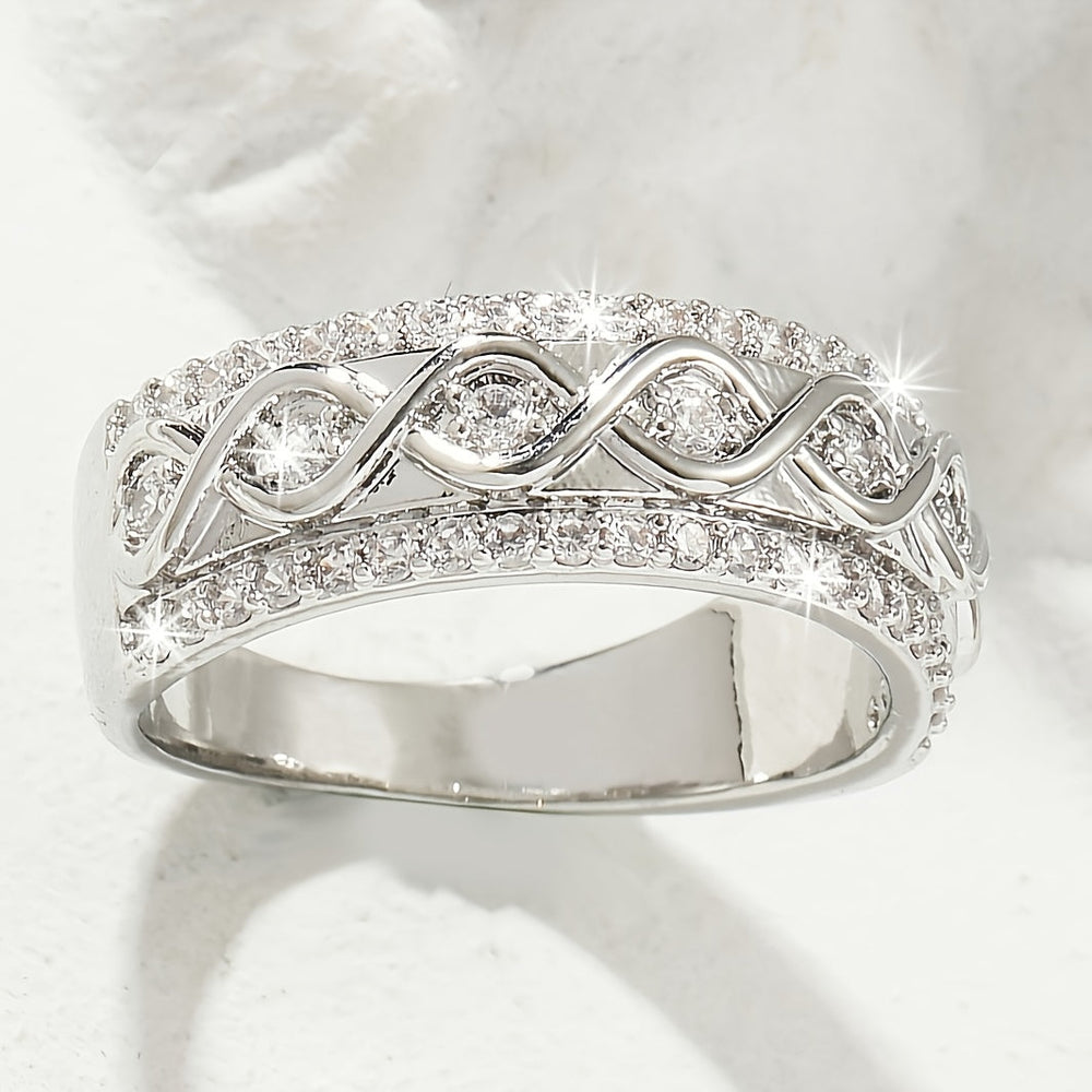 Bague en or blanc avec double rangée de zirconiums