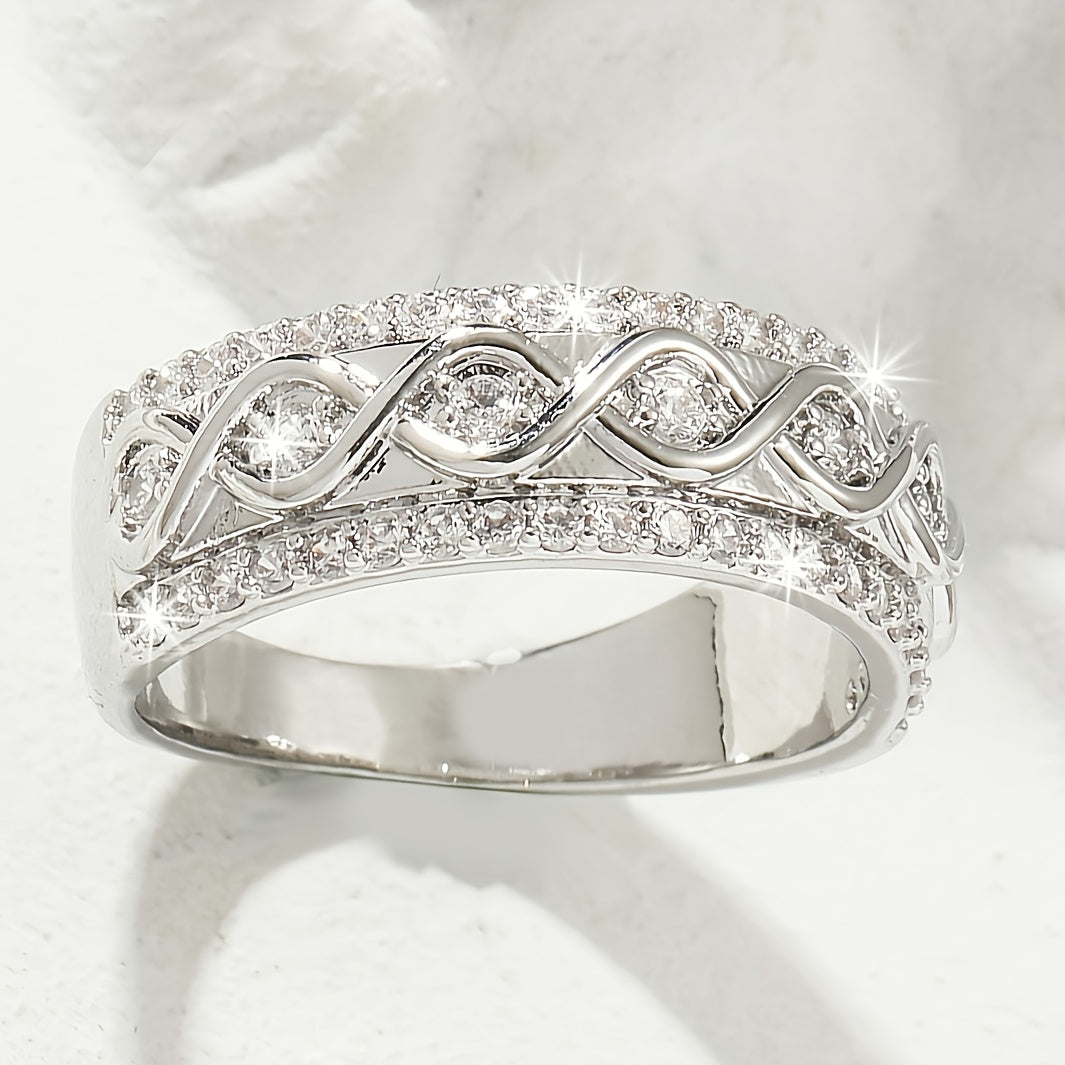 Bague en or blanc avec double rangée de zirconiums