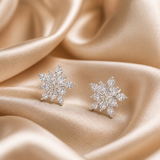 Boucles d'oreilles en or blanc en forme de flocon de neige