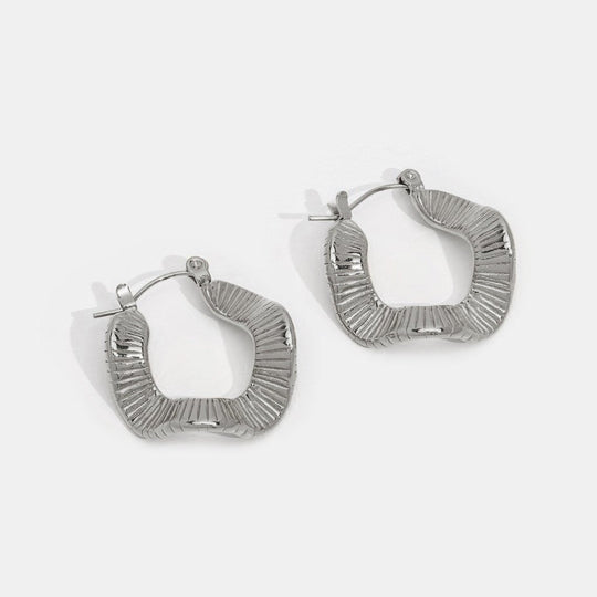 Boucles d'oreilles créoles en argent à motif géométrique