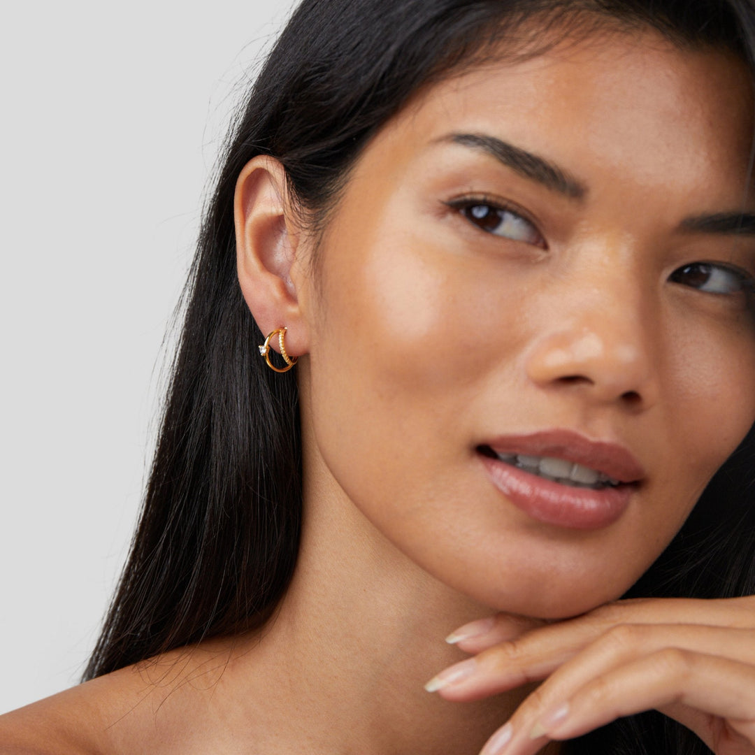 Boucles d'oreilles créoles en or avec cristaux superposés