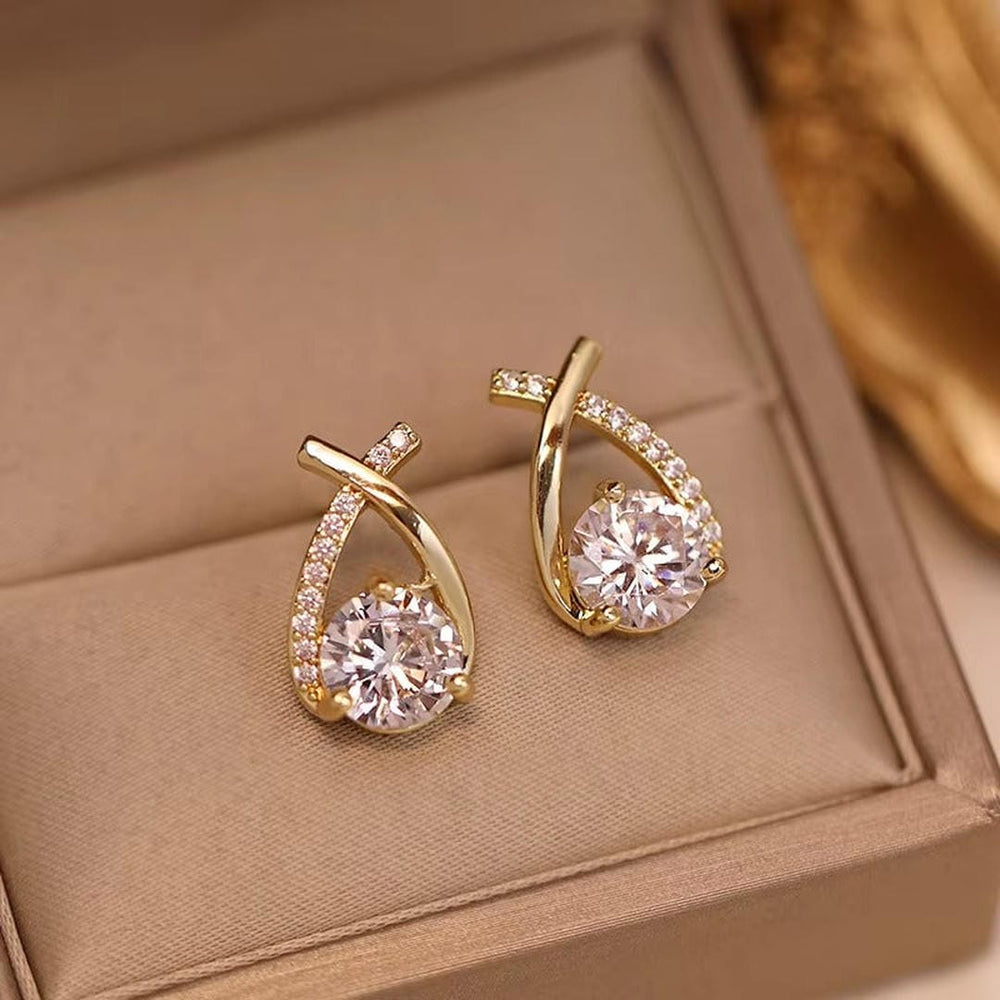 Boucles d'oreilles en cubic à goutte d'eau torsadée de luxe