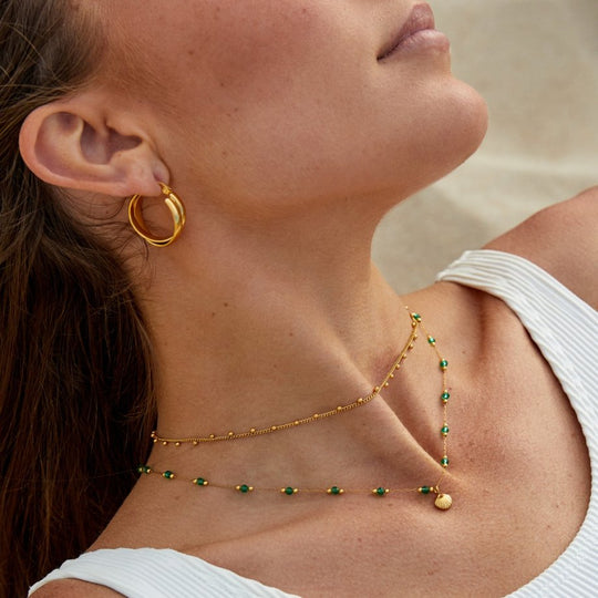 Collier Coquillage Nerissa et Perles Vertes en Or