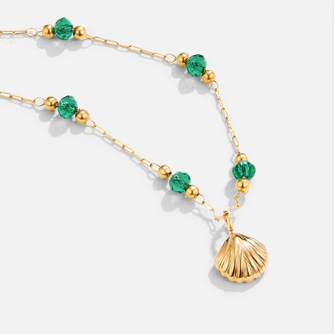 Collier Coquillage Nerissa et Perles Vertes en Or