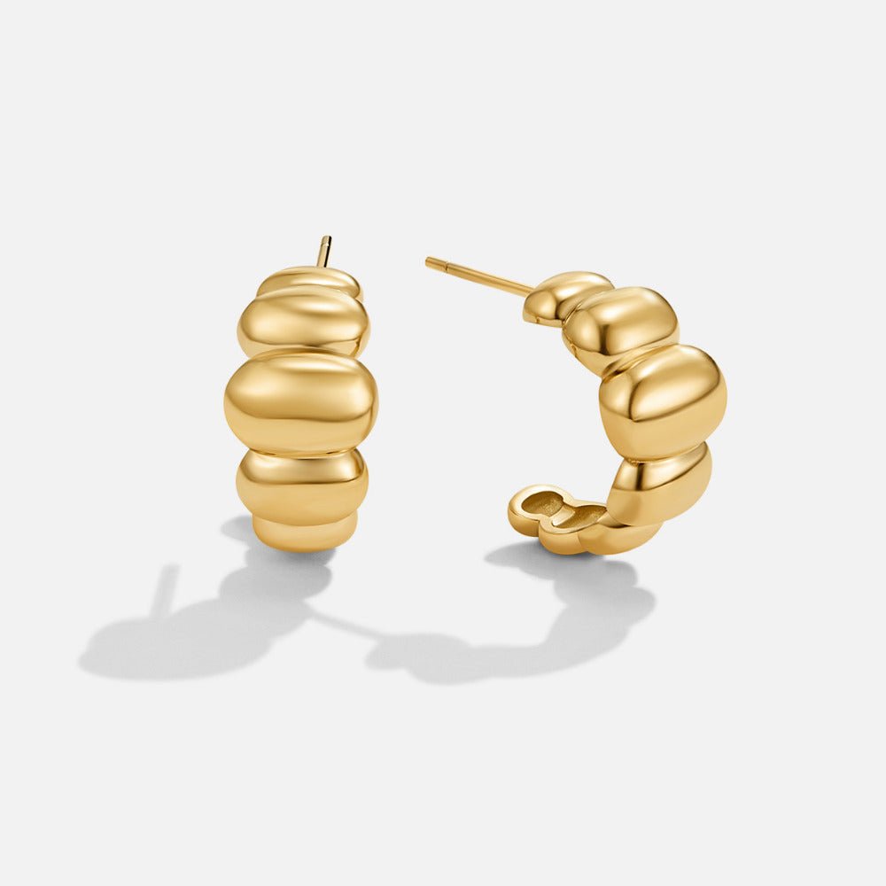 Boucles d'oreilles Puff en or Rene