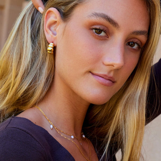Boucles d'oreilles Puff en or Rene
