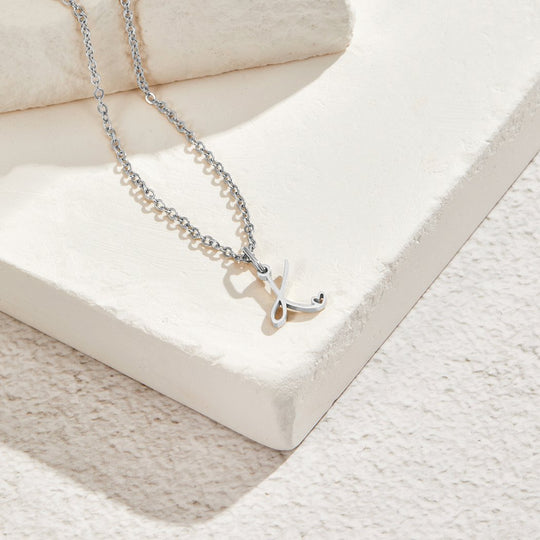 Collier en forme de cœur avec lettre en argent