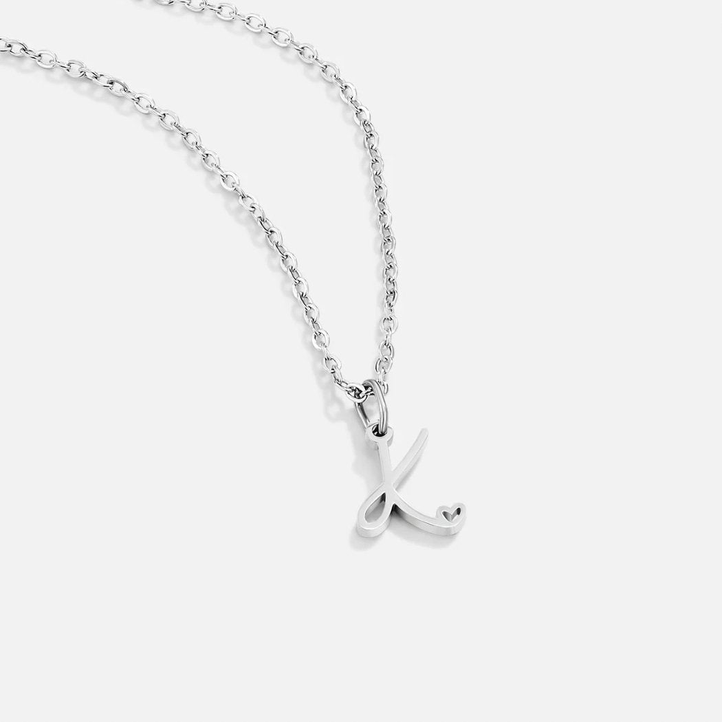 Collier en forme de cœur avec lettre en argent