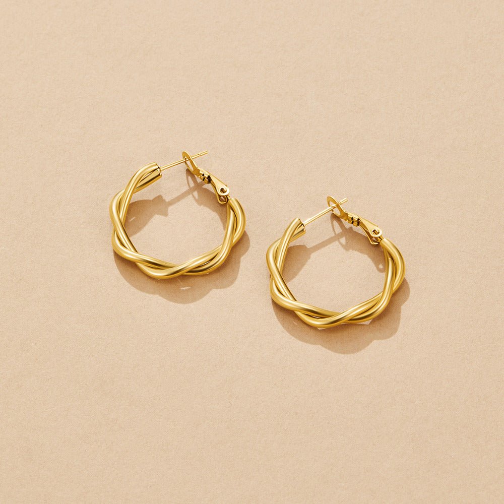 Boucles d'oreilles créoles Celine Tordues