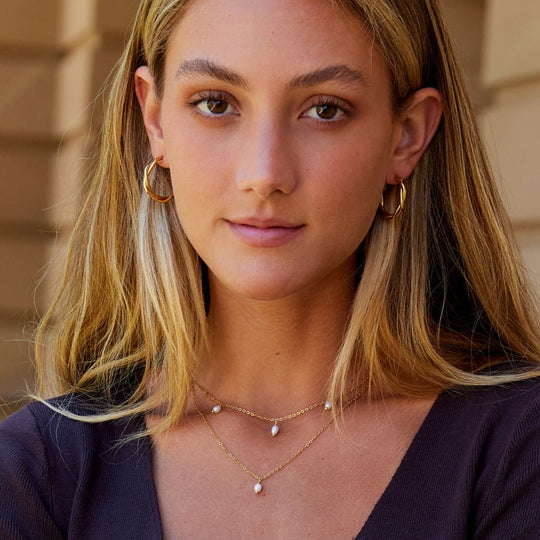 Boucles d'oreilles créoles Celine Tordues