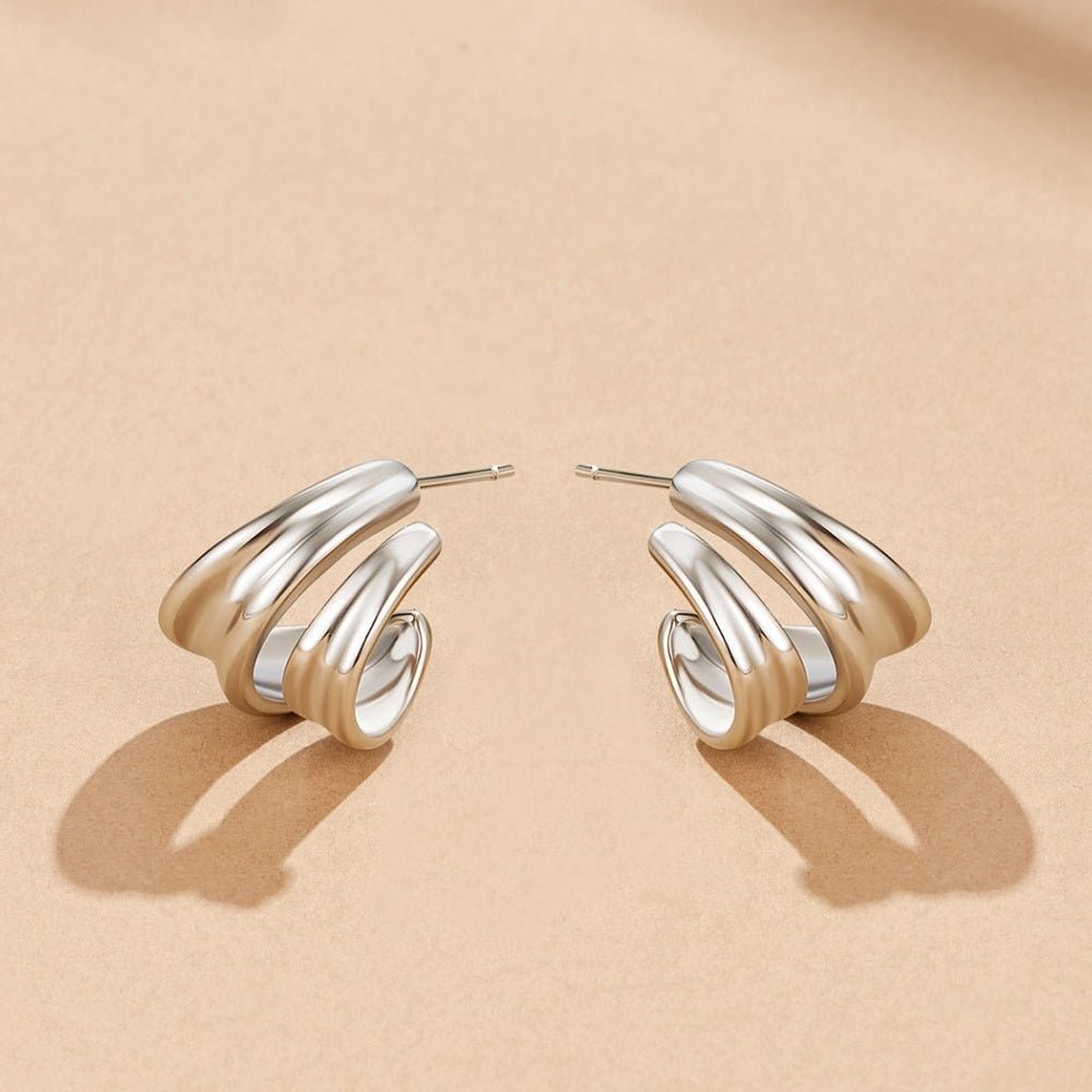 Boucles d'oreilles créoles en argent Ivana torsadées