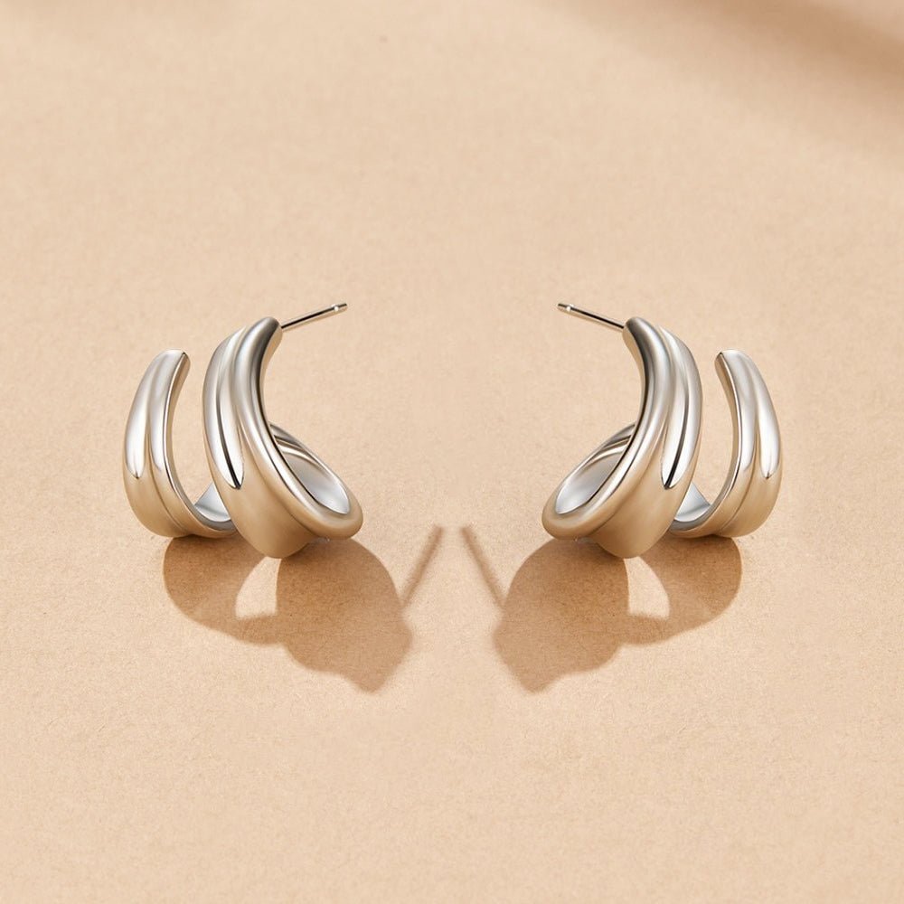 Boucles d'oreilles créoles en argent Ivana torsadées