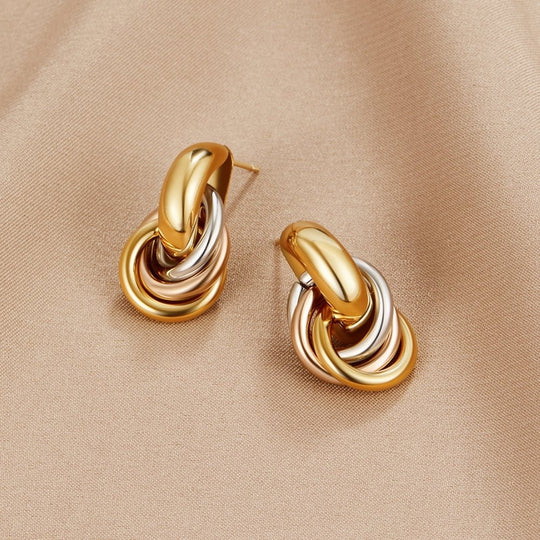 Boucles d'oreilles créoles torsadées trois tons