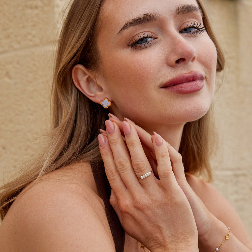 Boucles d'oreilles en trèfle blanc
