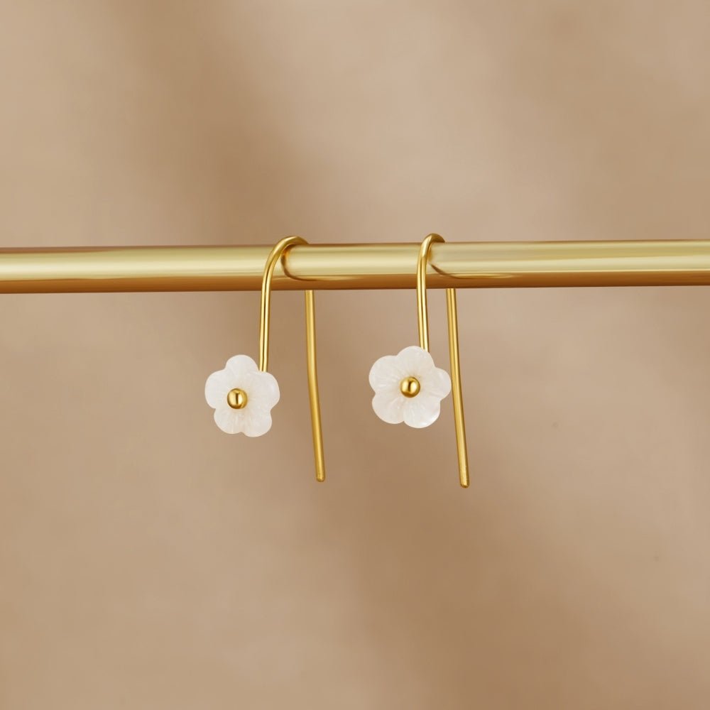 Boucles d'oreilles en forme de coquillage blanc